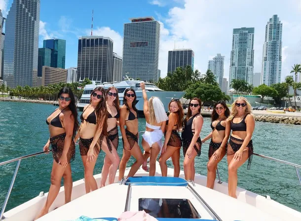 Yacht party group with downtown Miami views