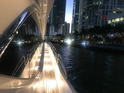 Evening view of Miami skyline from a yacht deck